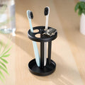 Black Stainless Toothbrush Holder Stand: Rustproof Bathroom Countertop Organizer, 4 Ventilated Slots Hold Manual Toothbrushes, Razor