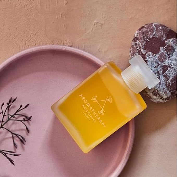 Aromatherapy Associates Inner Strength Bath and Shower Oil, Natural Body Oil to Uplift Mind, Body and Spirit, Made with 3 Essential Oils (1.86 oz)