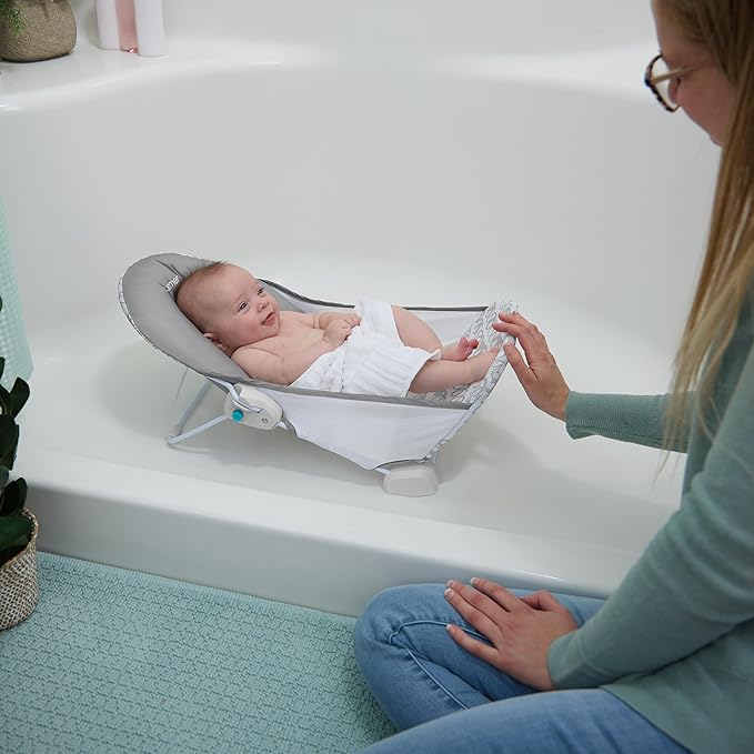 Ingenuity Foldaway 2-Position Baby Bath Seat, Adjustable Support for Sink or Bathtub, Ages 0-6 Months up to 20 Pounds, Machine-Washable Sling